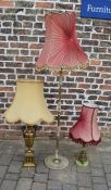 2 table lamps and a standard lamp