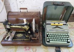 Singer sewing machine and a Hermes 2000 portable typewriter