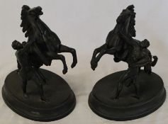 Pair of spelter Marley horse figure groups