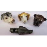 Cigarette box by State Express Cigarettes containing 3 ceramic dog whistles and a pewter dog