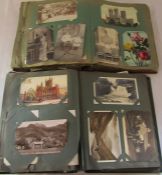 2 postcard albums containining assorted topographical, comic and greeting cards etc