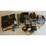 2 vintage Commodore Solid State Electronic calculators with one adaptor & the original boxes &