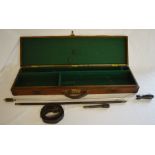 Vintage gun case with cleaning rods