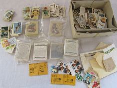 Various cigarette cards and stamps inc W D & H O Wills & 'Sporting Personalities' by Gallaher Ltd