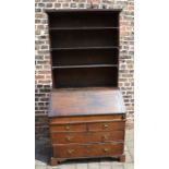 Georgian oak bureau with later bookcase over