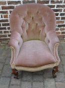 Victorian button back arm chair on mahogany scroll legs