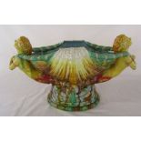 20th century Majolica shell shaped vase with figural handles 53 cm x 31 cm (repair to arm)