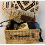 Wicker picnic basket containing evening bags, scarves, handkerchiefs, gents sunglasses, miniature