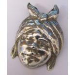 White metal dress clip of an African woman by Keim Ltd London H 6 cm