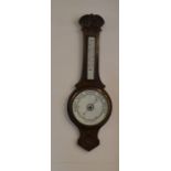 Early 20th century carved aneroid barometer