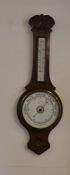 Early 20th century carved aneroid barometer