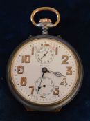 Zenith alarm pocket watch in a gun metal case with luminous numerals (some worn). Pitting to back of