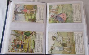 Postcard album containing approximately 200 cards relating to children, featuring scenes of