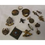 Trenchware coin cap, selection of military badges including Notts & Derby, Australian Commonwealth