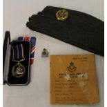 National Service medal No 39516, RAF cap, Empire Air Armament School badge & RAF service release