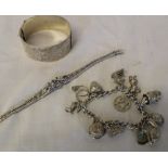 Silver charm bracelet (1.84 ozt), silver cuff bracelet (1.95 ozt) & white metal bracelet marked
