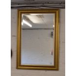 Gilt framed wall mirror