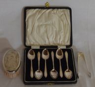 Cased set of six silver teaspoons, silver sugar bows & a silver rimmed christening brush