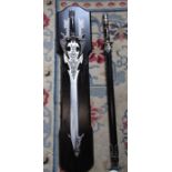 2 fantasy reproduction swords, one with display plaque