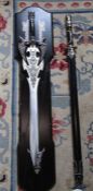 2 fantasy reproduction swords, one with display plaque