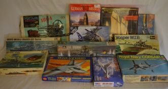 12 boxed model kits mainly planes & war ships