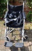 Folding wheelchair with carry bag