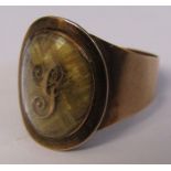 Georgian gold mourning ring oval mount  enclosing a hair plait and a letter 'G' inscribed to back of
