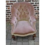 Victorian button back arm chair on mahogany scroll legs