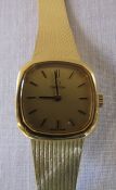 18ct gold Ladies Omega wrist watch with 18ct gold strap (slight twisting to strap) total weight 35.2