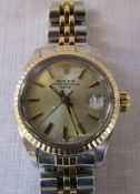 Ladies bi-metal Rolex oyster perpetual date wrist watch (repair required to strap)