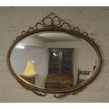 Gilt framed oval mirror