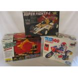 3 boxed radio controlled toys - Nikko super shovel, Taiyo Super fight F-1 and a Galoob Mean Lean