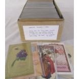 Box of assorted greetings postcards and cards dating from the early 1900s onwards featuring cats,