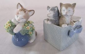 Lladro cat with a vase of flowers & a Nao figure of two kittens in a basket