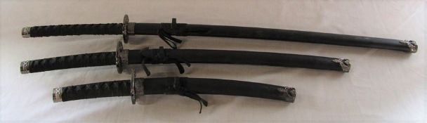Set of 3 reproduction Japanese swords and scabbards