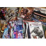 Large selection of Transformers comics and books