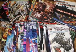 Large selection of Transformers comics and books