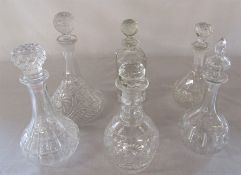 Wicker basket containing 6 cut glass decanters