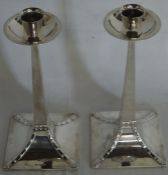 Pair of Arts & Crafts weighted silver candlesticks, maker James Deakin & Sons Sheffield 1906 (