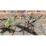 Trench art models of a wooden Spitfire and Hurricane on stands