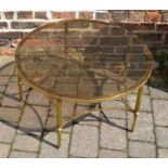 Circular brass & glass top coffee table