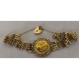 Elizabeth II half sovereign 1982 mounted in 9ct gold gate bracelet total weight 12.6 g