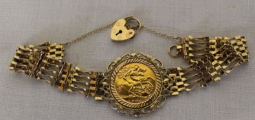 Elizabeth II half sovereign 1982 mounted in 9ct gold gate bracelet total weight 12.6 g