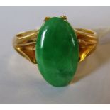 Tested as 18ct gold Oriental ring with 2.5ct jade stone (size 15 mm x 8 mm) size P total weight 6.