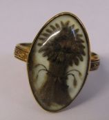 Georgian gold mourning ring inscribed around band 'Eliz Sanderson OB 20 August 1783 AE:50' with hair