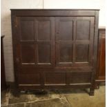 Early 18th century oak panelled cabinet on stile legs (one back leg missing) H 165 cm L 153 cm