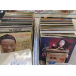 2 boxes of mainly 1970s/ 80s  33 rpm LPs and singles inc Madonna, Eurythmics, Leo Sayer, Journey,