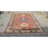 Red ground Persian style carpet 313 cm x 204 cm