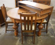 Oak wind out table with 2 leaves & 4 chairs extending to 211cm by 121cm