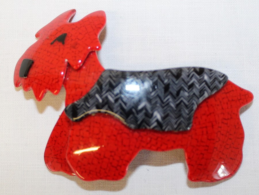 Lea Stein plastic brooch in the form of a red Scottie dog - the locking bar pin stamped Lea Stein